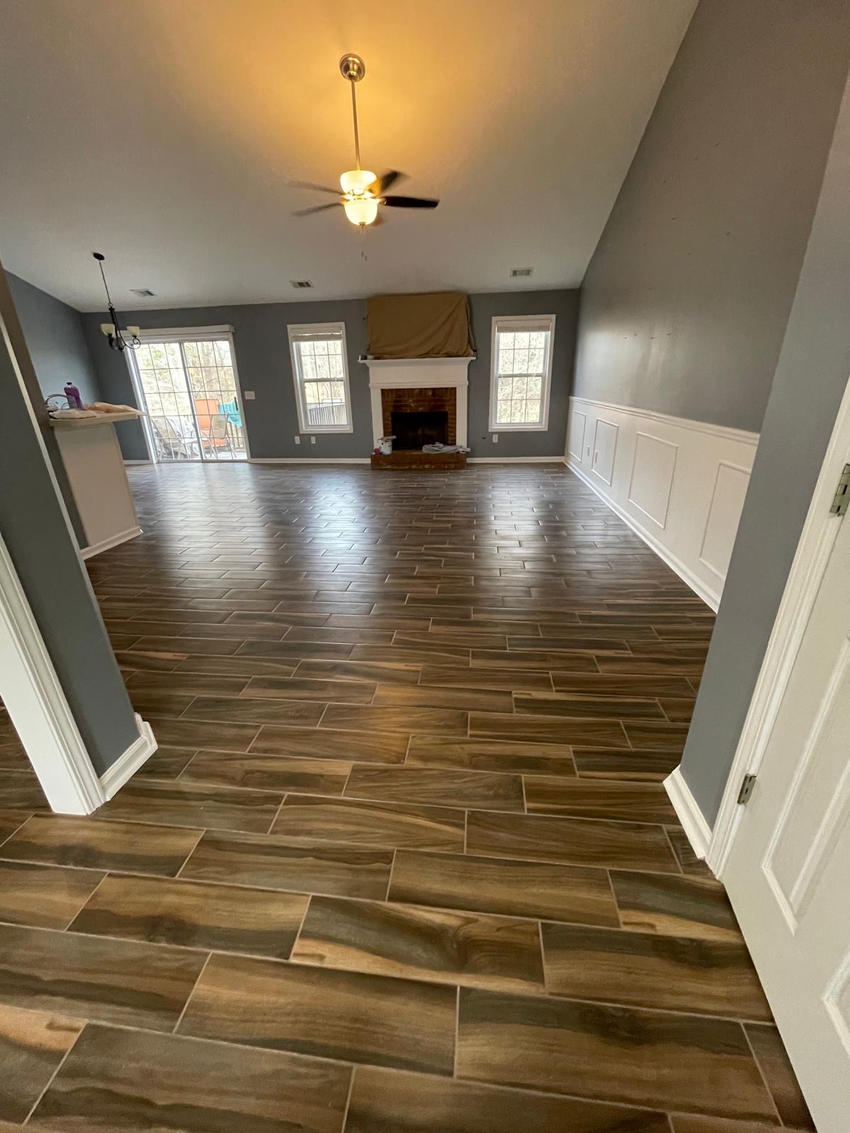 Wood-look tile flooring living room
